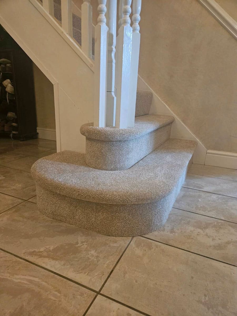 curved bottom step, fitted by BDL Carpets & Vinyl in Sheffield